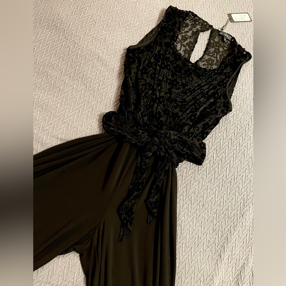 Unique Black Jumpsuit. Velvet & Sheer fitted V-Neck top with soft flowing pants.